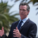 Newsom’s missing party affiliation
