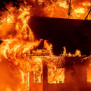 ‘Like a hammer hitting us in the head’: Homes ablaze in California as Western wildfires rage