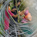 Malaysians suffering amid lockdown fly white flag for help