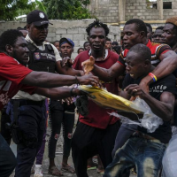 Fighting breaks out over aid distribution after Haiti earthquake