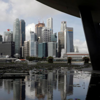 Asia’s global finance hubs Hong Kong and Singapore are taking aim at “foreign interference”