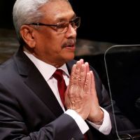 Rights group seeks arrest of ex-Sri Lanka president in Singapore