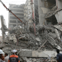 Iran building death toll reaches 31 as protests continue