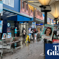 ‘The poor bugger belongs to the wrong party’: voters cast early ballots in two key Sydney seats