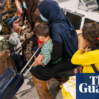 Shoeless, shivering, passing out: Afghan refugees arrive in the UK