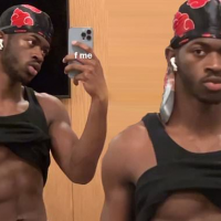 Lil Nas X shows off his washboard abs in a shirtless Instagram selfie