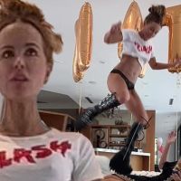 Kate Beckinsale poses up a storm in underwear and leather boots day