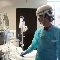 US COVID-19 deaths top 1918 flu estimates as vaccine, mask battles continue