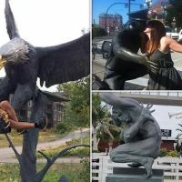 People pose with statues to make it look like something else going on