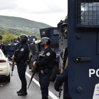 Several reported injured as Kosovan police clash with Serb crowd around Mitrovica amid rising tensions (VIDEO)  —  RT World News
