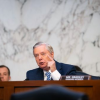 QAnon supporters cheer GOP attacks on Jackson, Democrats see a signal – The Boston Globe