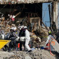 Suspects who stole Surfside condo collapse victims’ identities to go shopping are caught