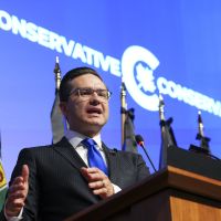 Poilievre Issues Tax Challenge to Trudeau in First National Caucus Address