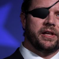 Rep. Dan Crenshaw and staff confronted by Proud Boys, far right…