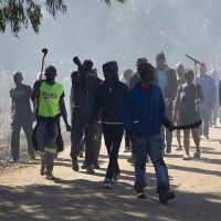 South Africans Wielding Machetes Attack Illegal Miners over Gang Rape
