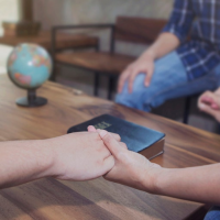 Student athletes lead fans, parents in prayer after school prohibits coaches from participating