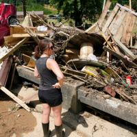 A tidal wave of water and at least 22 deaths as floodwaters ravage rural Tennessee