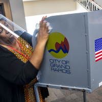 Whitmer vetoes Republican election bills aimed at voiding registration for certain voters