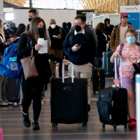 DOJ Asks Court to Overturn Ruling on Airplane, Transport Mask Mandates