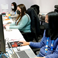 Behind the scenes at the Winter Olympics: Journalists in a bubble, robots making cocktails