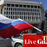 Putin signs treaty to annex Crimea as Ukraine authorises use of force