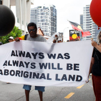 Australia says it will give $55,000 to survivors of an old practice that took indigenous children from their families to live in white communities