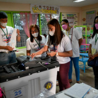 Strong voter turnout in Philippines as Marcos targets presidency