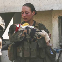 Slain Marine who cradled baby at Kabul airport loved her job