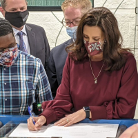 Whitmer signs Michigan budget into law, praises bipartisan nature of negotiations