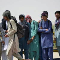 Afghans Flock To Iranian Border, But Few Can Cross