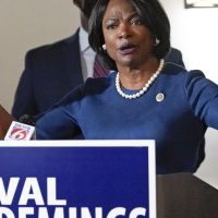 WATCH: Val Demings security team pushes video tracker to the ground