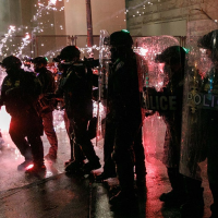 Armed private security fills police void in downtown Portland where riots, shootouts occurred