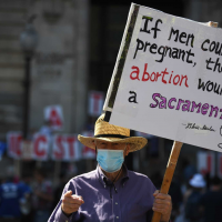 ‘Keep Your Laws Off My Body’: Women’s March protesters rally across U.S. to protect Roe v. Wade