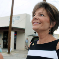 Rival congresswomen greet Afghan refugees at New Mexico base