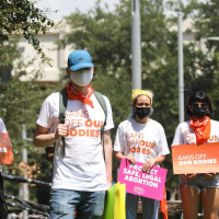 Opinion: Don’t just fight abortion bans. Build an economy of care.