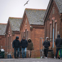 Home Office plans to keep housing migrants at ‘squalid’ site in defiance of ruling