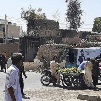 Second Afghan city falls as Taliban tighten noose over countryside