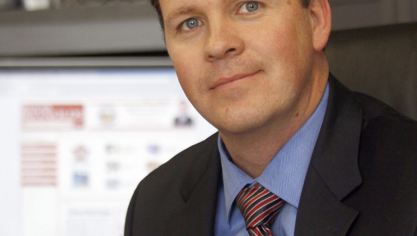 Who is Roger Reynolds, the Butler County auditor charged with corruption?