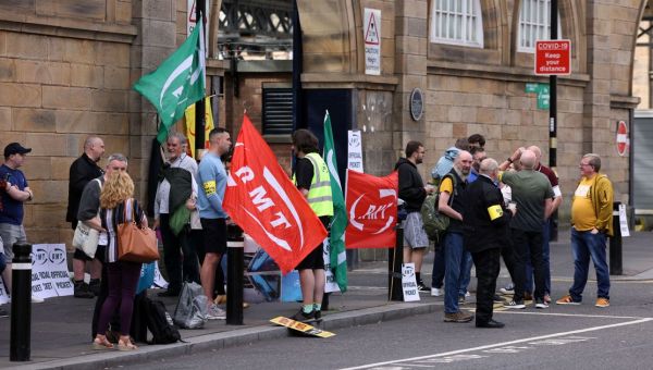 RMT workers striking over pay and jobs are determined to win
