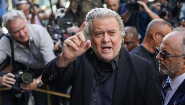 As Bannon Surrenders, Charges Are Revealed