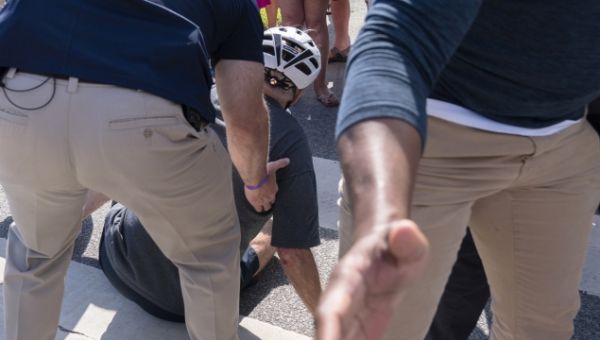 Biden Takes Spill While Getting Off Bike After Beach Ride