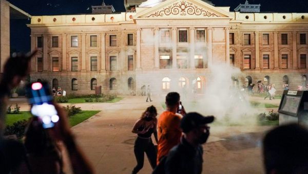 Law enforcement deploys tear gas at Arizona Capitol on people protesting overturning of Roe v. Wade