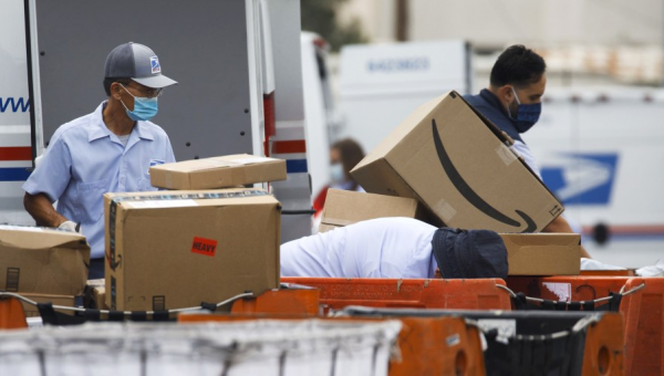 Workers hope new law becomes an economic lifeline for Postal Service