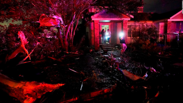 Crews are combing through devastated neighborhoods in the New Orleans area after a deadly tornado tore through the region