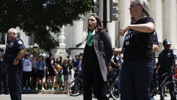 Did AOC and the Protesting Congresspeople Really Put Their “Bodies on the Line”?