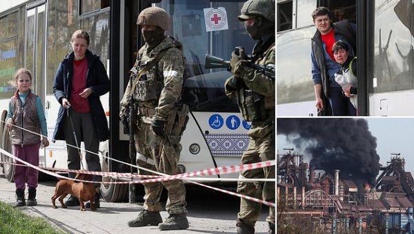 Steel plant workers hug their families after evacuation from Mariupol