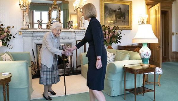 Truss shakes hands with Queen as she official takes over as PM