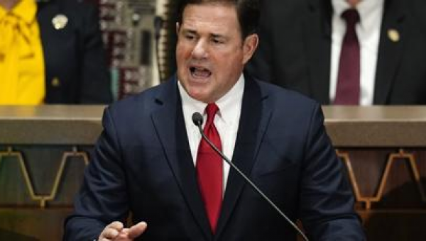 Arizona governor signs bills limiting abortion, trans rights