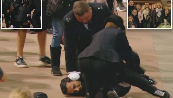 Mourner describes man who was arrested for grabbing Queen’s coffin
