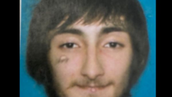 Man arrested in connection to parade shooting had posted videos appearing to preview attack